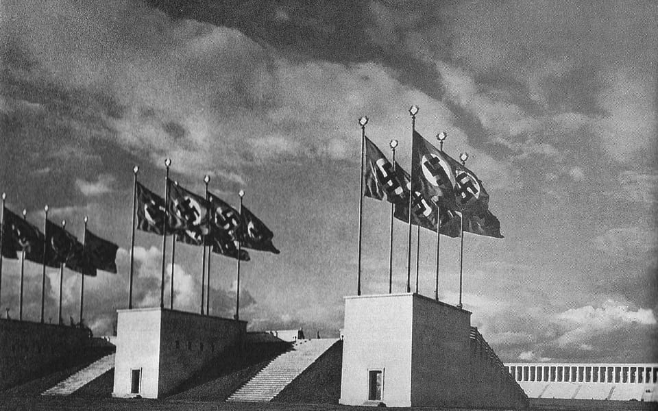 The towers of Zeppelinfield in Nuremberg with Nazi banners