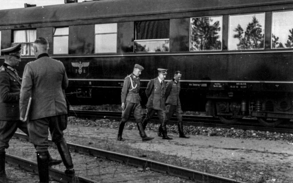 Engel, Hitler, and Schmundt next to Hitler's special train in Poland