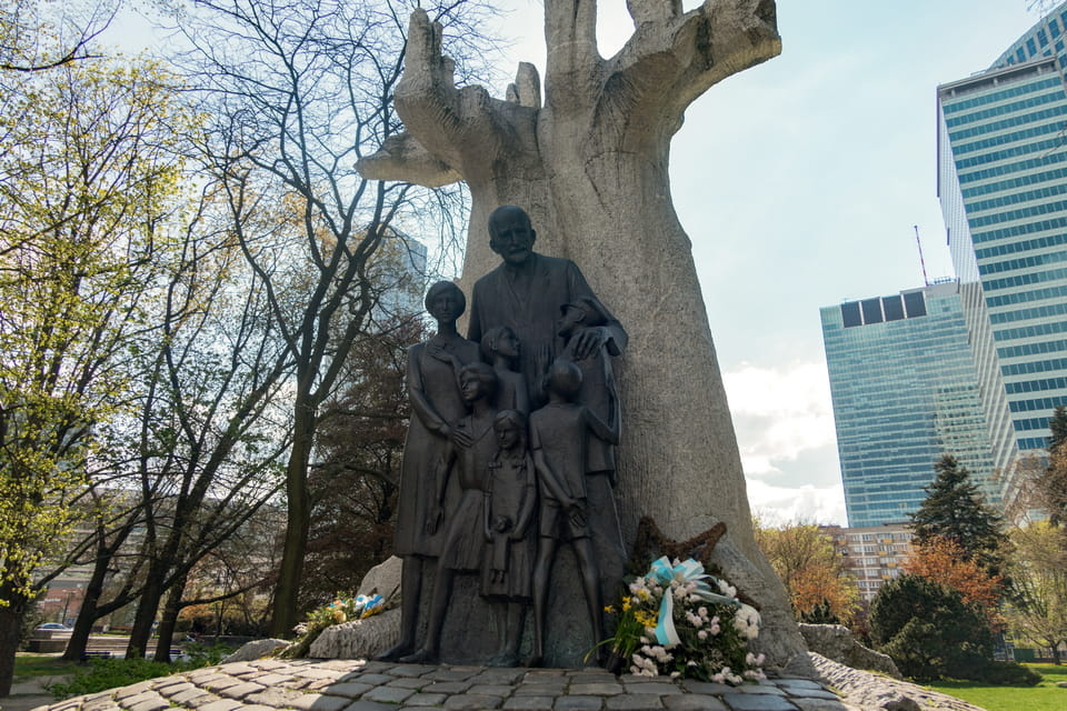 Janusz Korczak born Henryk Goldszmit and a monument devoted to him in the center of Warsaw