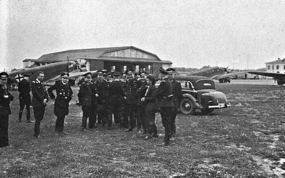 German officers during landing in Kiev, 1942. Junkers JU-52 transport planes are in the background