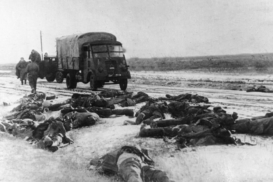 Bodies of German soldiers on the road southwest of Stalingrad near an abandoned Renault truck AHS