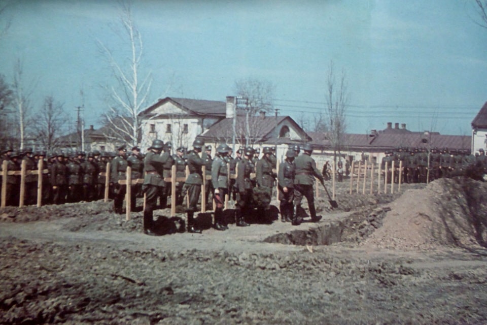 A unit of the German 6th Army at the burial of dead soldiers at the divisional cemetery in the occupied city of Chuguev, Kharkov region