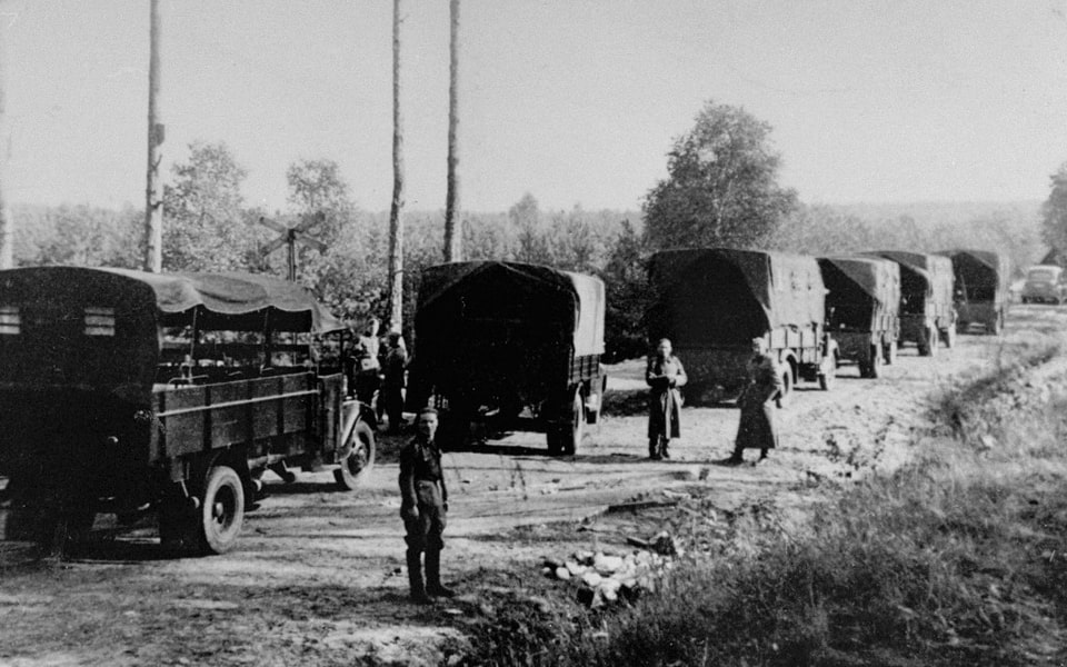 Empty trucks on the way back from mass executions in Palmiry, 1940