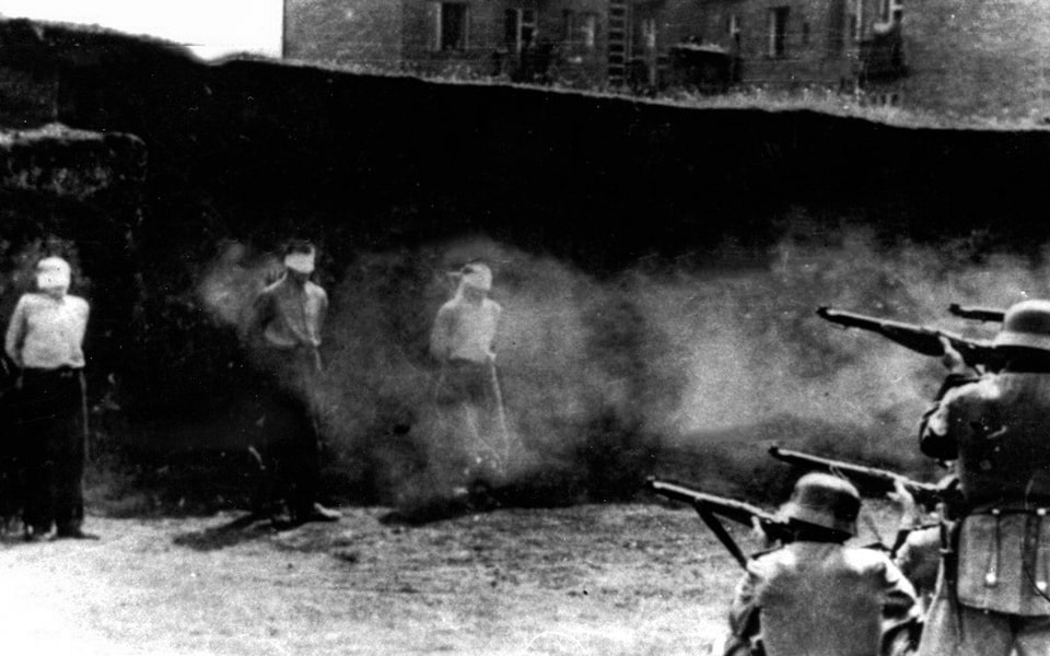 A German firing squad executing Polish civilian 1944