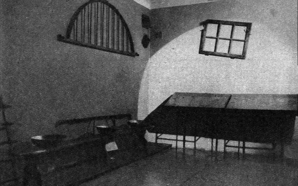 1982 , Pawiak Prison Museum. This room contains objects recovered from the ruins bowls, grates, benches.