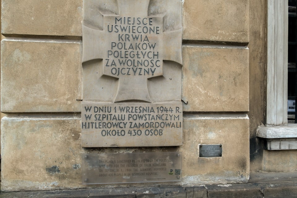 A commemoration sign devoted to 430 people killed in the building