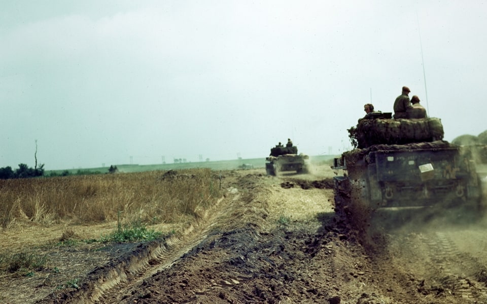Two Canadian Cromwell tanks on the road south of the French city of Caen.