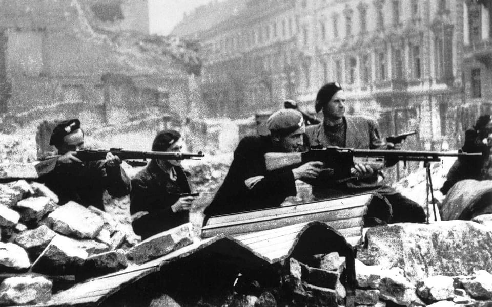 Warsaw in flames. Members of the Polish Home Army fight the Germans, August 1944