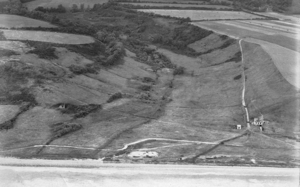 Aerial reconnaissance of Ruquet Valley (E-1 draw) at Saint-Laurent-sur-Mer, June 30, 1943 — future Omaha Beach exit route