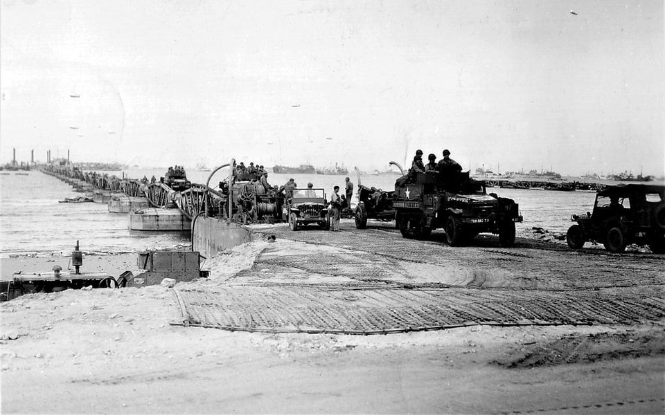 Unloading equipment of the 2nd US Infantry Division at Mulberry A, Omaha Beach