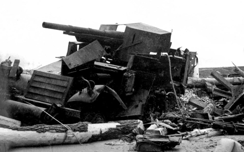 Wreck of a halftrack with 75mm cannon (Les Moulins)