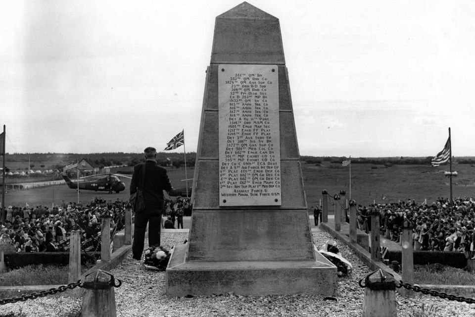 A French official makes his speech during D-Day ceremonies at Omaha Beach Monument. The monument was erected at the scene of the Normandy Invasion, which took place during World War II. 1960