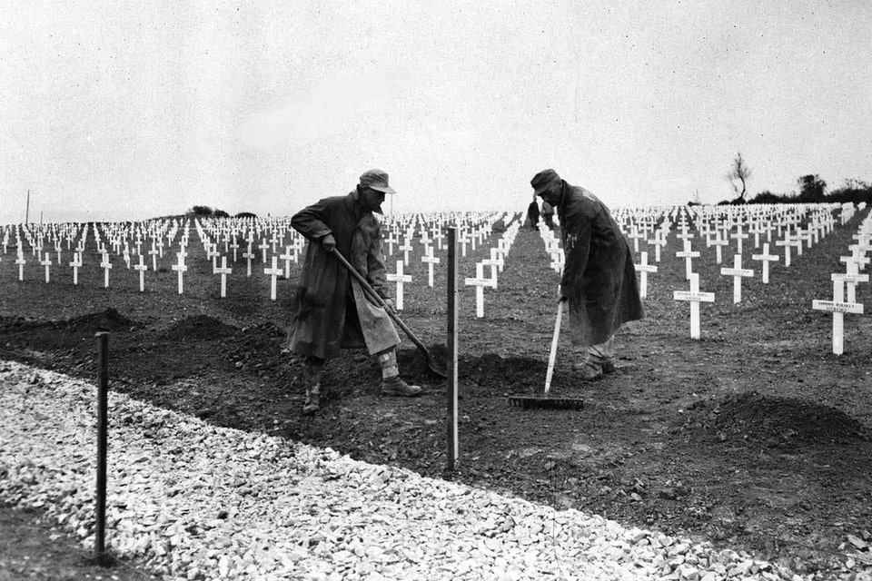 German prisoners at the first US cemetery at Saint-Laurent-sur-Mer