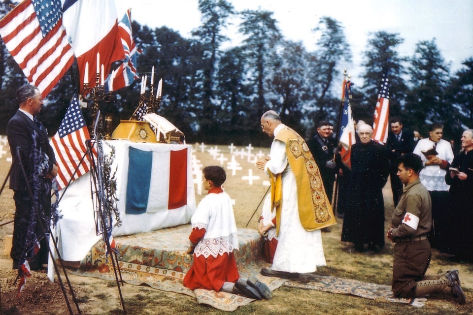 Catholic Mass at the American Military Cemetery in Colleville-sur-Mer. The town is near the Omaha Beach landing zone of Operation Overlord.