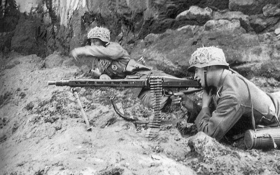 Soldiers of the 352nd Infantry Division of the Wehrmacht, which defended Omaha Beach in Normandy, train shortly before D-Day, the landing of Allied troops