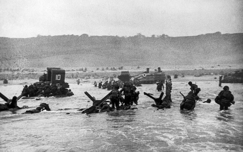 Troops of the 16th Regiment storming Omaha Beach