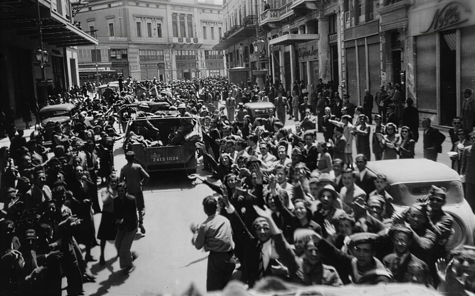 Despite the fact that they were abandoning Greece to the Germans this column of New Zealand troops were given a warm farewell when they passed through Athens on ANZAC Day