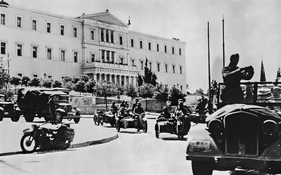 A German transport column outside the Parliament building (Royal Palace, also known as the "Old Royal Palace") in Athens