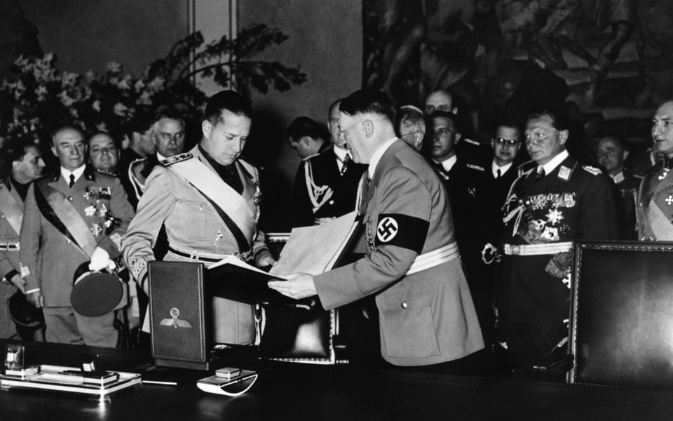 Signing of the German-Italian military alliance (Steel Pact) in the New Reich Chancellery. Adolf Hitler hands over the treaty to Italian Foreign Minister Count Ciano. May 22, 1939.
