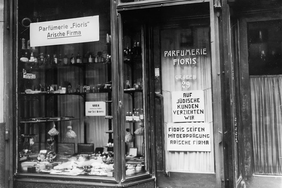 View of a perfume shop in Vienna with posted signs certifying that the enterprise is an Aryan firm. 1938