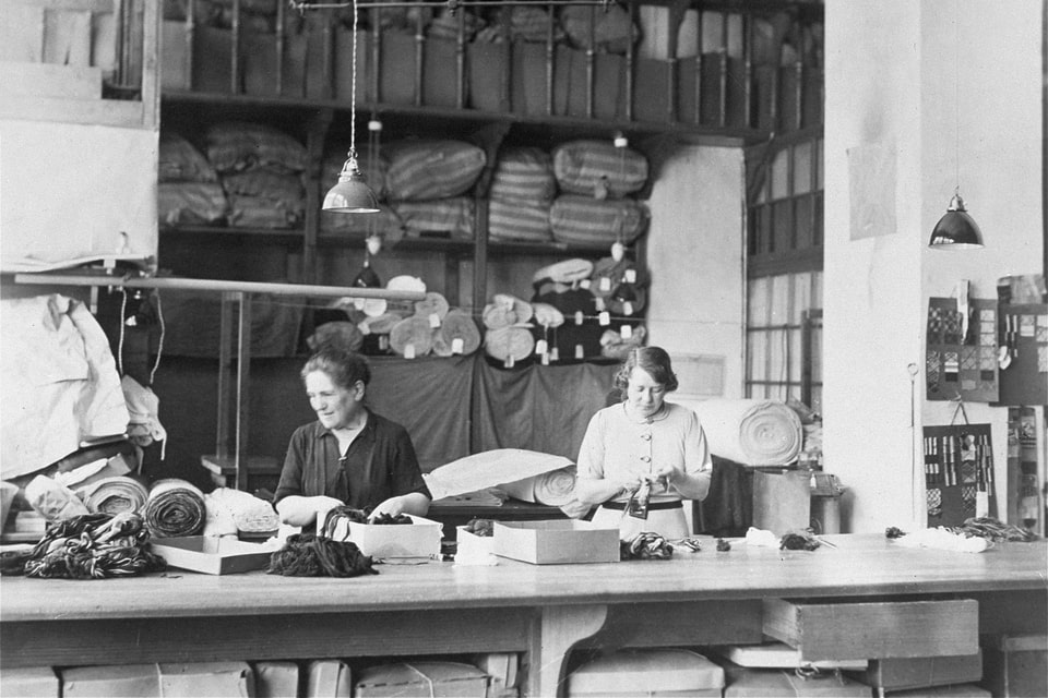 Women at work in a Jewish-owned textile mill in Vienna. 1935
