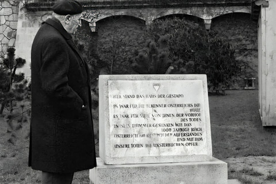 Simon Wiesenthal in front of the memorial plaque at 1., Morzinplatz, where the headquarters of the Gestapo headquarters in Vienna was located in the Hotel Métropole from 1938-1945, 1975
