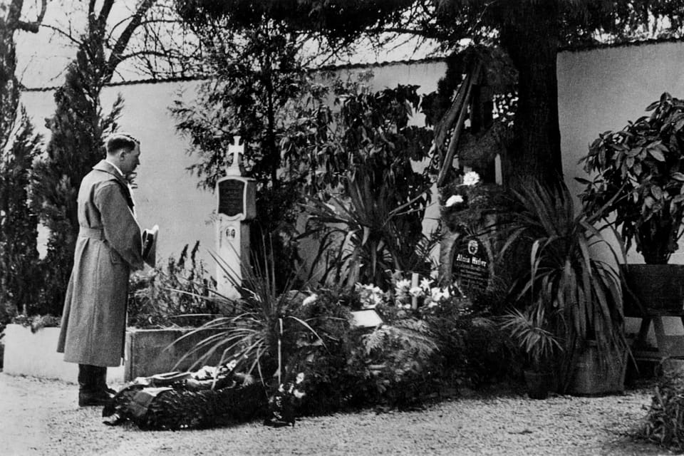 Adolf Hitler at his parents gravesite in Leonding on 13 March 1938