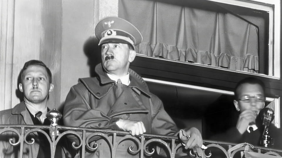 August Eigruber, Adolf Hitler and Arthur Seyß-Inquart on the balcony of the town hall on Linz’s main square