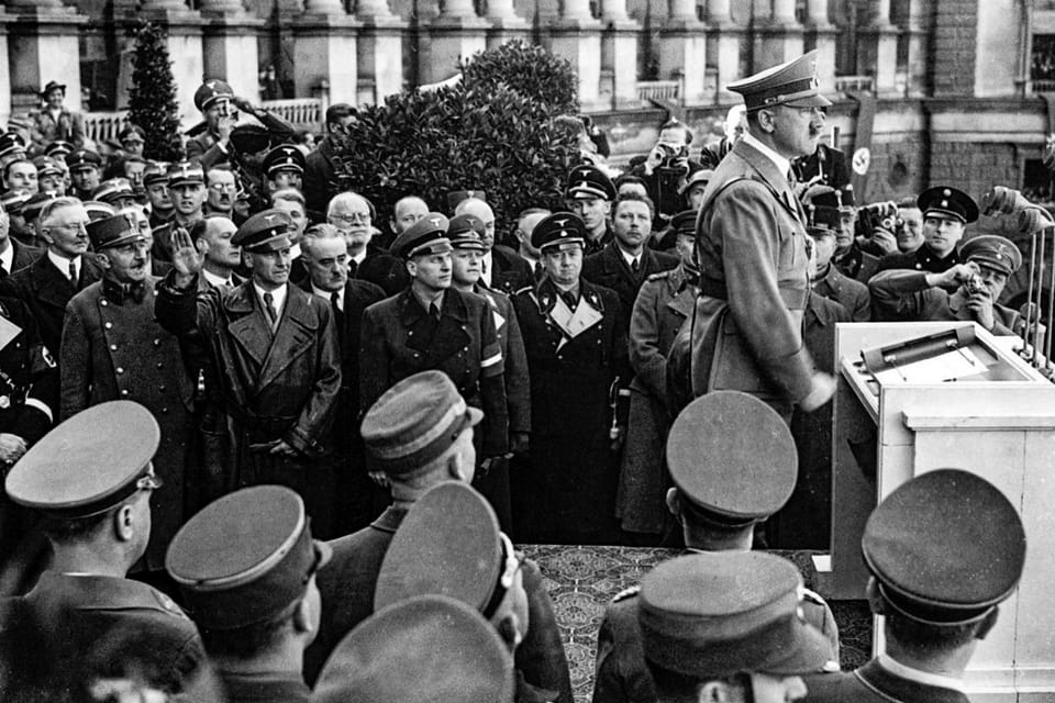 On Tuesday, March 15, 1938, Adolf Hitler speaks to his people and the world for the first time from the balcony of the Winer Hofburg