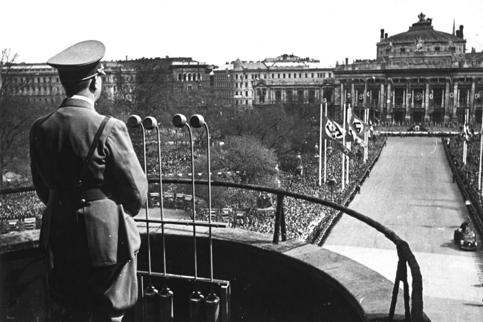 Hitler speaking from the temporary wooden balcony built onto Vienna City Hall for 9 April 1938 — later replaced in stone