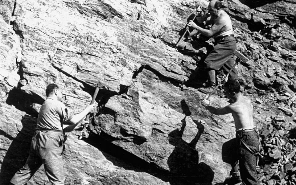 Jewish forced laborers in the quarry of a forced-labor camp established by the Hungarian government