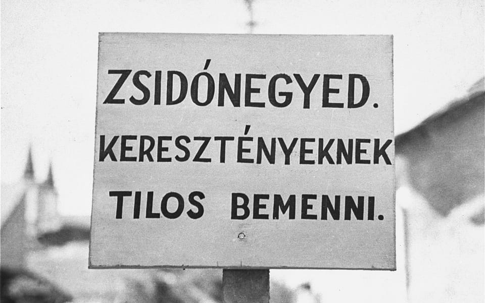 Sign at the entrance to the Jewish quarter of Budapest: Entrance forbidden to Christians