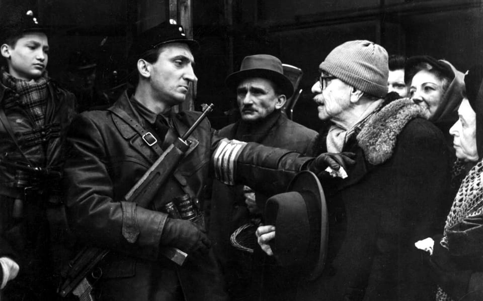Budapest, Hungary, A still from a film depicting a member of the Arrow Cross Party arresting a Jew