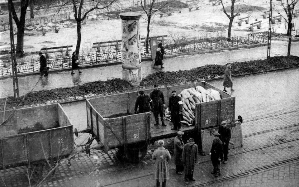 The transport of bodies of deceased residents of the Budapest ghetto in a freight car. Üllői út Street, view from one of the buildings of the Institute of Forensic Medicine.
