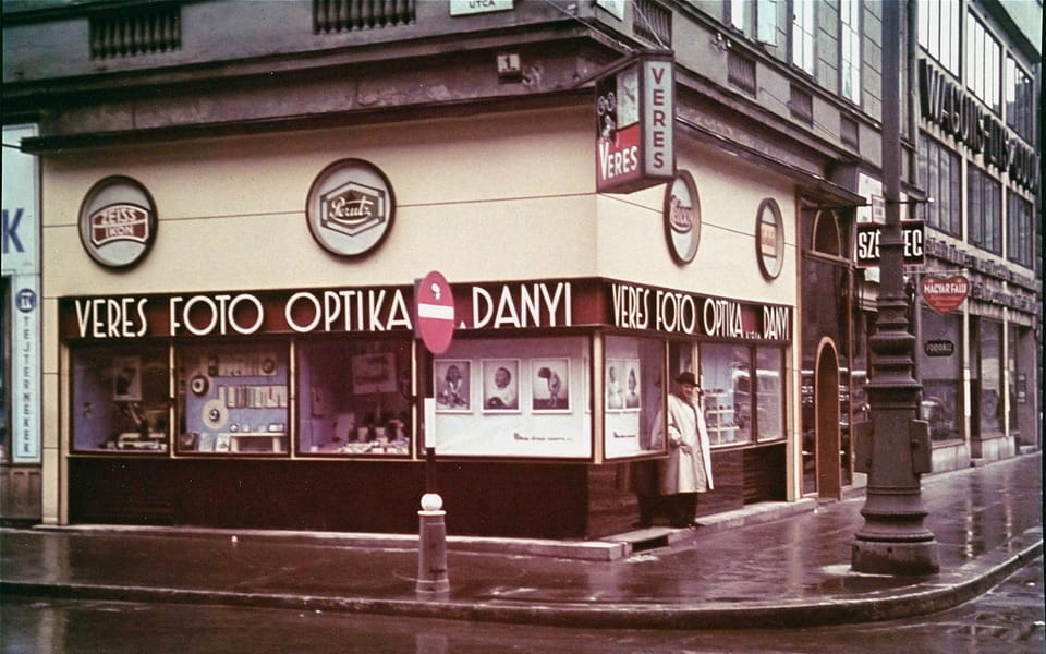 Hungarian Jewish photographer Paul Veres, standing in the doorway of his camera shop and photo studio in Budapest-